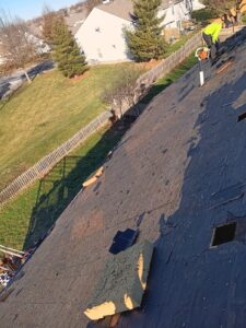 storm damage roof repair near me.